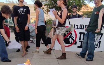 Israeli teenagers burning draft orders in Central Tel-Aviv